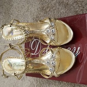 Gold high heel dress shoes with bling